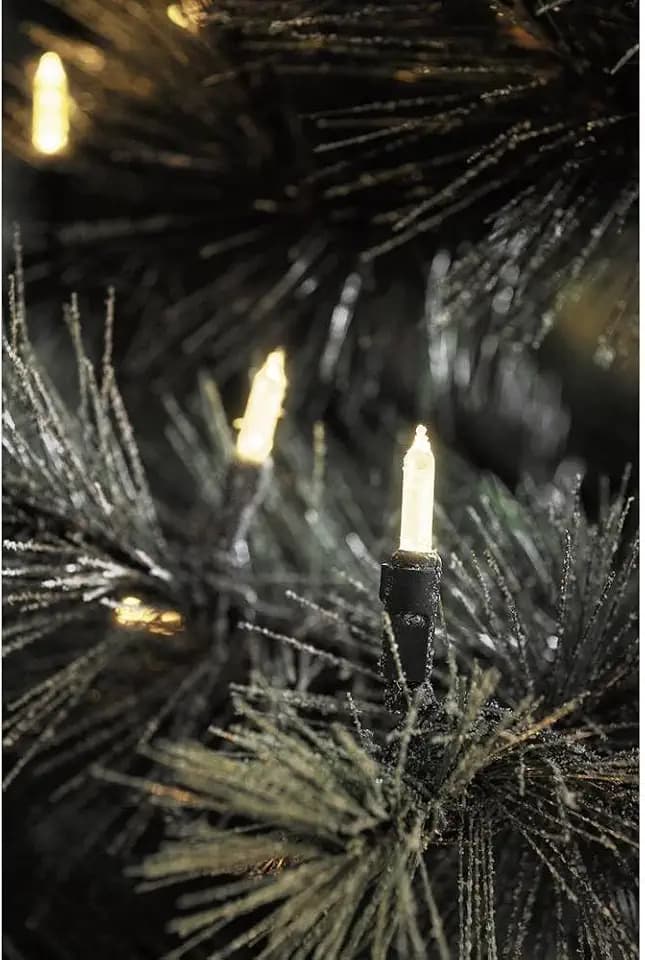 Konstsmide LED Minilichterkette, 20 warm weiße Dioden, 24V Außentrafo, grünes Kabel - 6002-100