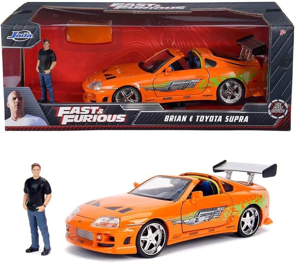 Jada Toys - Fast and Furious Modellauto Toyota Supra & Brian - Auto-Modell 1995 Toyota Supra Mk4 1:24 Orange Mit Brian O'Conner Figur, Fahrzeug Mit Spoiler, Zu Ã–ffnenden Teilen & Abnehmbarem Dach