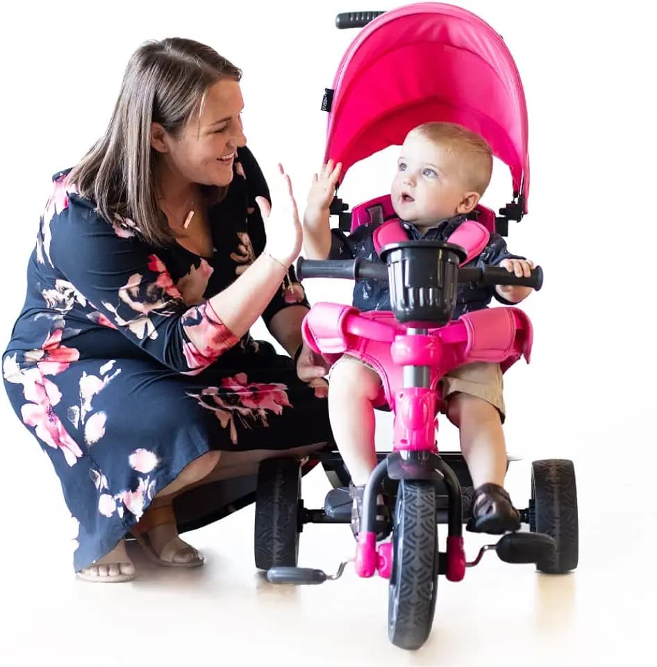 Joovy Tricycoo 4.1 Kids Tricycle with 4-Stages Featuring Extra-Wide Front Tire, Removable and Adjustable Parent Handle, Safety Harness, Machine-Washable Seat Pad, and Retractable Canopy (Pink)