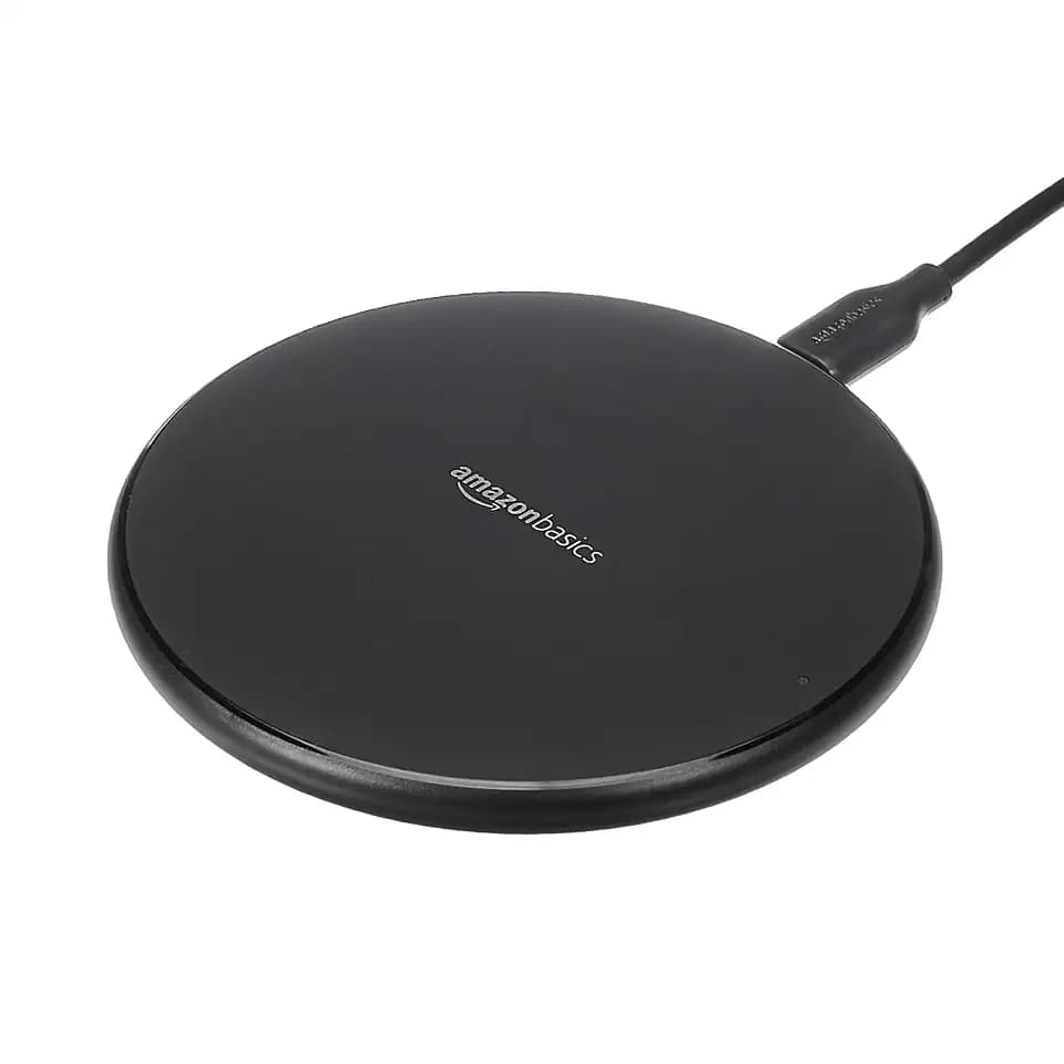 Amazon Basics Wireless Charger, 15W Qi Certified Wireless Charging Pad with USB Cable, Compatible with iPhone 15/14/13/12/11/X, Samsung & LG, Case Compatible, Black