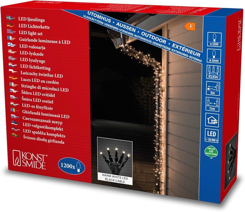 Konstsmide Micro LED Lichterkette, 1200 warm weiße Dioden, 24V Außentrafo, schwarzes Kabel - 3649-110