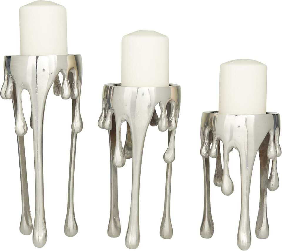 Deco 79 Abstrakte Stumpenkerzenhalter aus Aluminium mit schmelzenden Beinen, 30,5 cm, 25,4 cm, 20,3 cm hoch, silberfarben, 3 Stück