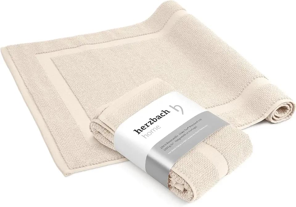 herzbach home Badvorleger 100% Baumwolle | Duschvorleger | 1.000 g/m² | Saugfähig | Waschbar (Creme, 50 x 80 cm 2er Pack)