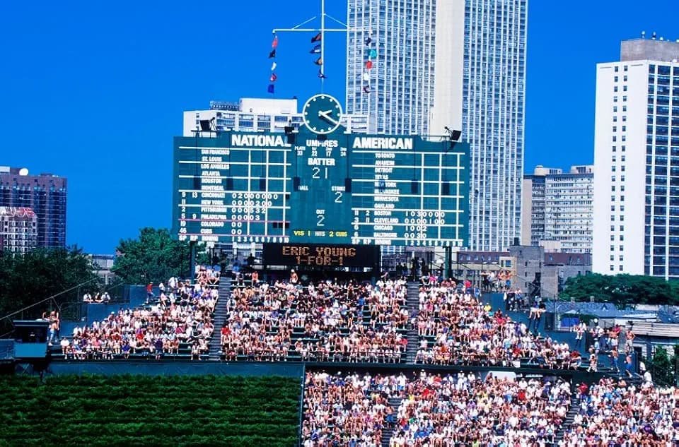 Long view of scoreboard and full bleachers during a professional baseball game Wrigley Field Illinois Poster Print by Panoramic Images (24 x 18)