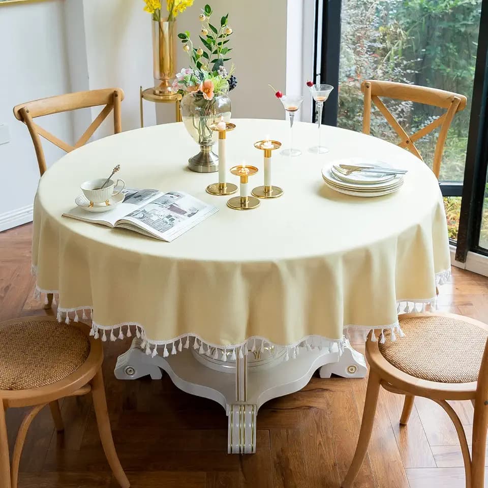 Jeloris Round Solid Color Tablecloth with Tassels Wrinkle Free Heavy Duty Washable Decorative Table Cover for Dining, Kitchen, Party, Buffet, Wedding, Banquet, Holiday (48 inch, Light Yellow)