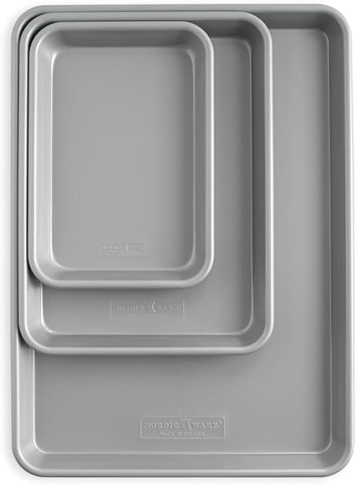 Nordic Ware Brilliant™ Colorful 3-Pc Baking Set, Nonstick made without PFAS or PTFE for safe cooking; Reinforced steel rim prevents warping; Includes Half Sheet, Quarter Sheet, and Eighth Sheet