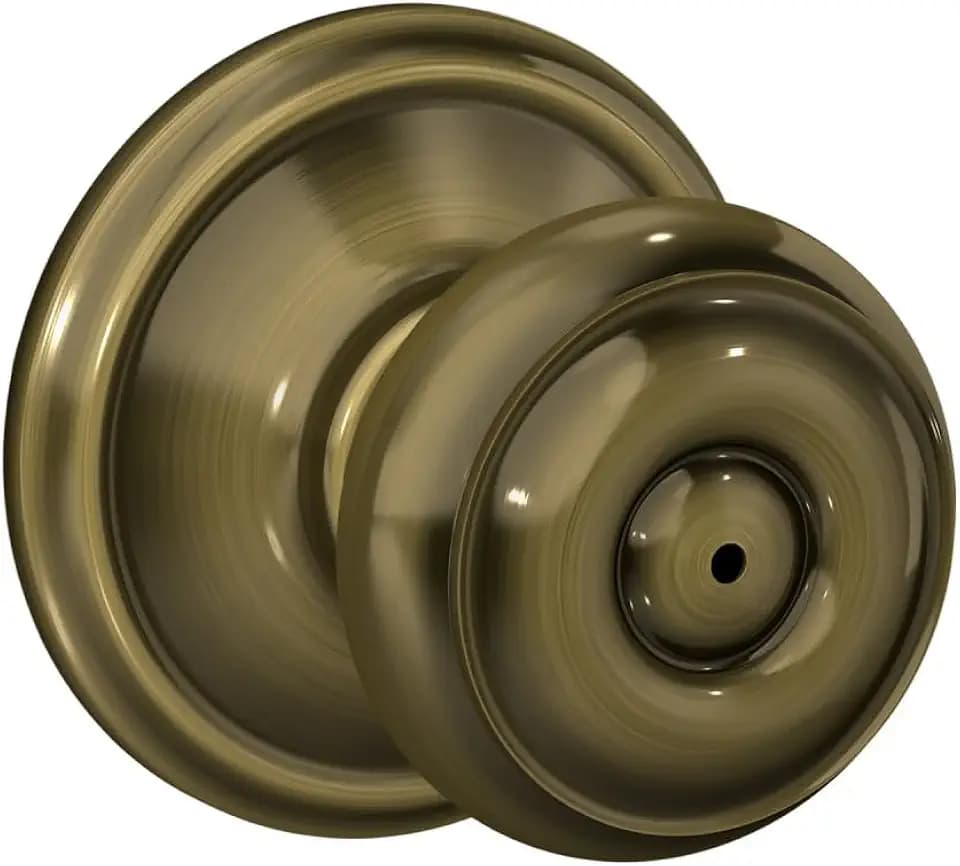Schlage F40 GEO 609 Georgian Door Knob, Bed & Bath Privacy Lock, Antique Brass