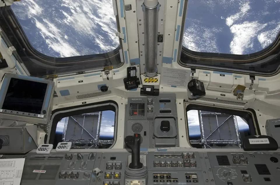 Posterazzi A view from inside the flight deck of Space Shuttle Atlantis Poster Print, (34 x 22)