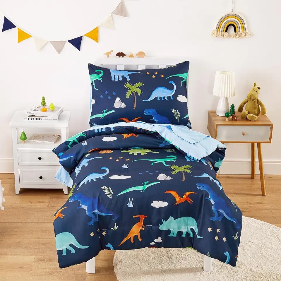 Wake In Cloud - Toddler Bedding Set for Boys, Colorful Jurassic Dinosaur Volcano, 4 Pieces Soft Crib Bed Set Including Comforter, Sheets and Pillowcase, Navy Blue