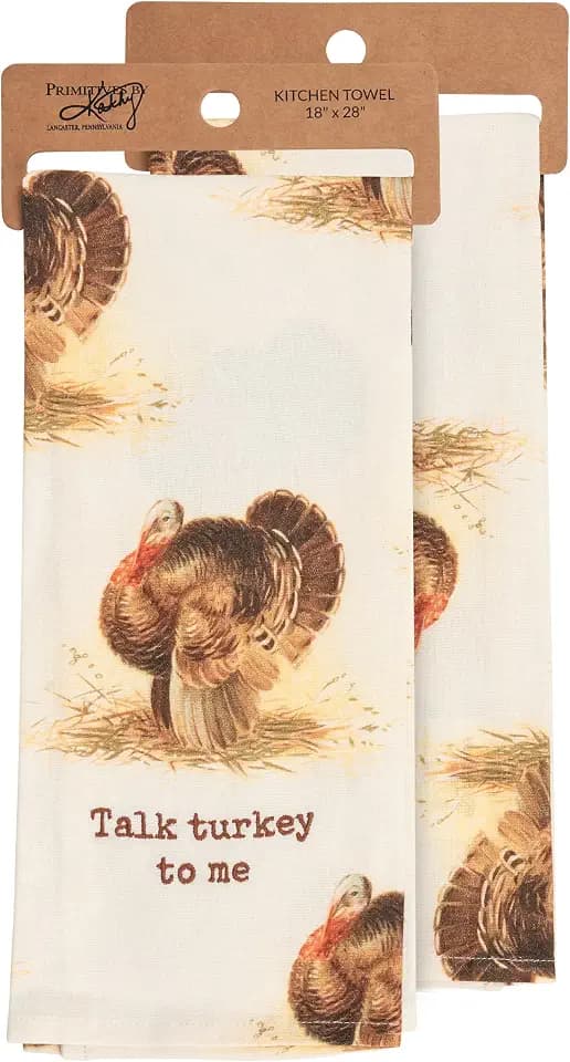 Primitives by Kathy Kitchen Towel, from Our Fall & Harvest Collection displaying All-Over Vintage Designs of Turkeys with a Coordinating Fall Inspired Pun That Reads Talk Turkey to Me.