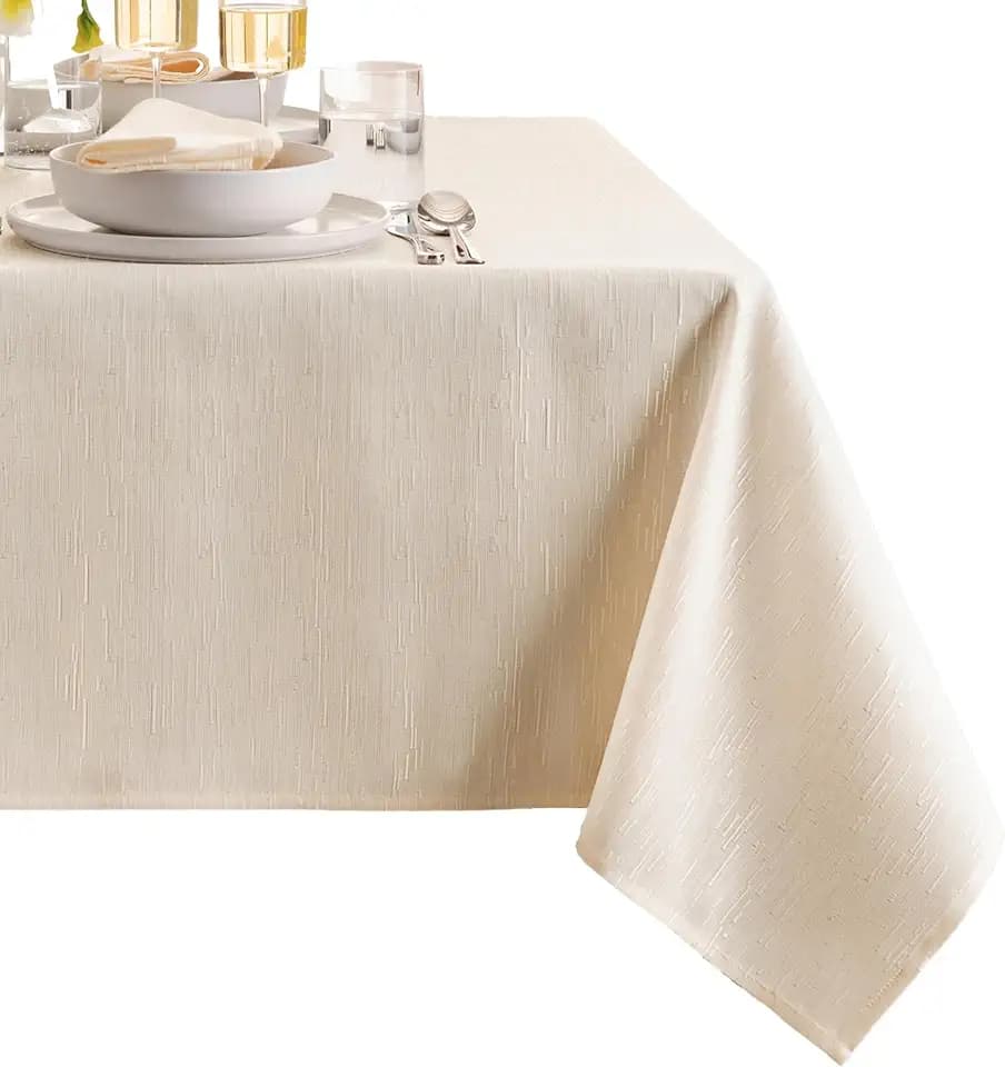 Continental Solid Texture Water Resistant Tablecloth, Ivory - 60" W x 102" L