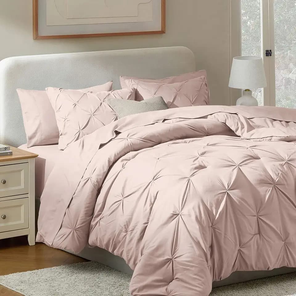 Nestl 9 Piece King Comforter Set – Blush Pink Pinch Pleated Bed in a Bag – Complete King Size Bedding Set with Sheets, Set of 2 Down Alternative Pillows, Pillowcases and Shams