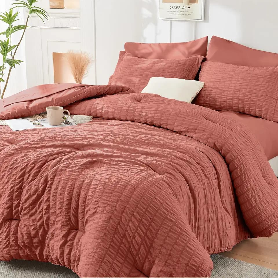 HYMOKEGE Coral Oversized King Comforter Set Seersucker 7 Pieces, All Season Luxury Bed in a Bag for Bedroom, Bedding Set with Comforter, Sheets, Pillowcases & Shams