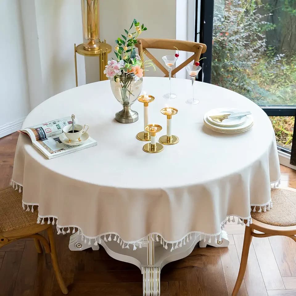 Jeloris Round Solid Color Tablecloth with Tassels Wrinkle Free Heavy Duty Washable Decorative Table Cover for Dining, Kitchen, Party, Buffet, Wedding, Banquet, Holiday (70 inch, Beige)
